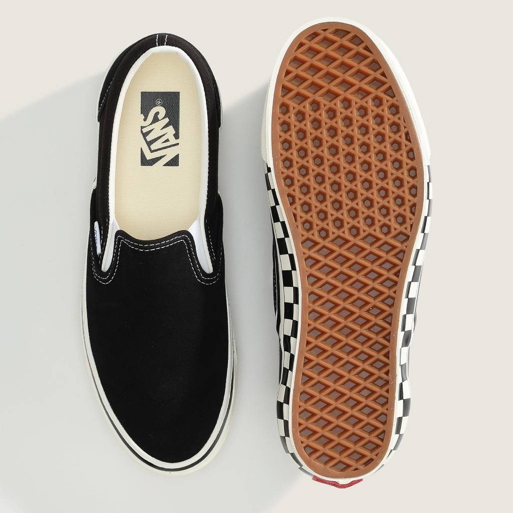 LX Classic Slip-On 98 (CHCKRBRD SIDEWALL BLACK/MARSHMALLOW) #Black/White [VN000E96BPQ]