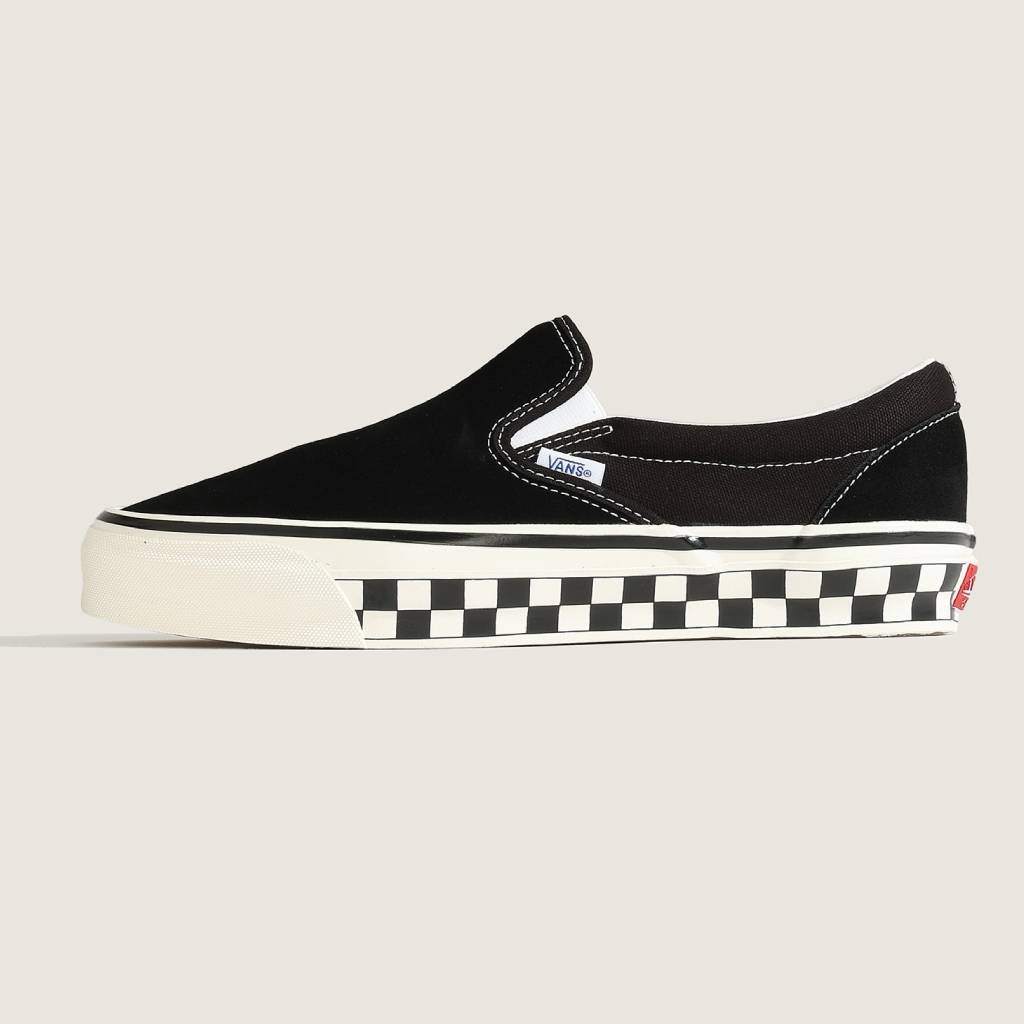 LX Classic Slip-On 98 (CHCKRBRD SIDEWALL BLACK/MARSHMALLOW) #Black/White [VN000E96BPQ]