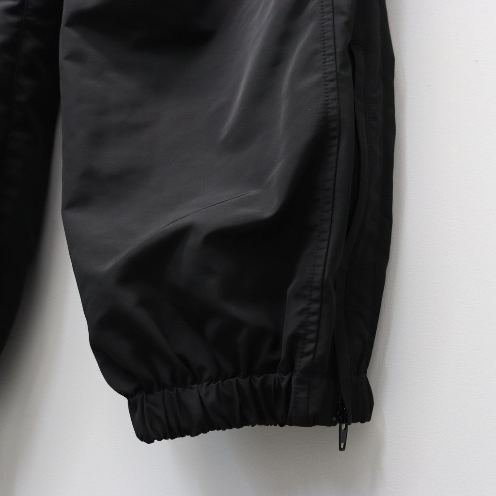 UMBRO | TRACK PANTS ( TYPE-1 ) #BLACK [26SS-WMO-UB02]