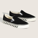 LX Classic Slip-On 98 (CHCKRBRD SIDEWALL BLACK/MARSHMALLOW) #Black/White [VN000E96BPQ]
