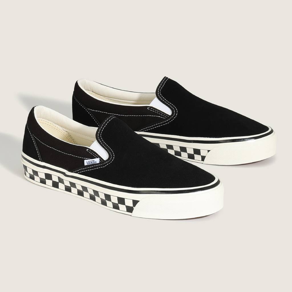 LX Classic Slip-On 98 (CHCKRBRD SIDEWALL BLACK/MARSHMALLOW) #Black/White [VN000E96BPQ]