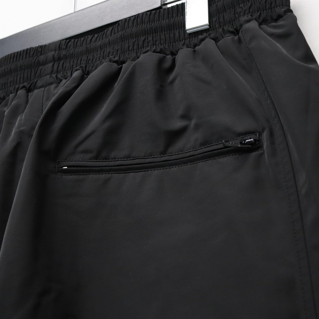 UMBRO | TRACK PANTS ( TYPE-1 ) #BLACK [26SS-WMO-UB02]
